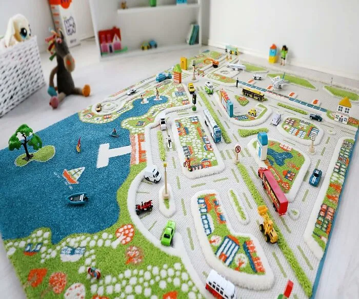 A <a Style="Display:inline;" Href="Https://Www.amazon.com/Ivi-Non-Toxic-Resistant-Educational-Montessori/Dp/B0764116kn?pd_rd_w=wt0vi&content-ID=amzn1.sym.8a163a7b-6a2a-45ae-8510-8d5419efb828&pf_rd_p=8a163a7b-6a2a-45ae-8510-8d5419efb828&pf_rd_r=68y2qqfrkqkhxrfw3401&pd_rd_wg=c1zl6&pd_rd_r=f5ff8654-81ba-442e-932a-Eae97419aa6d&pd_rd_i=b0764116kn&th=1&linkcode=ll1&tag=bpoctopus-20&linkid=8752064b43a37a3789ecc91c4d53cf92&language=en_us&ref_=as_li_ss_tl" Target="_blank">   <span Style="Font: Inherit; Color: #d74b1f;"> 3D City Play Rug </Span> Will Turn Your Floor From A Boring, Flat Surface Into A Bustling, Multi-Dimensional Metropolis Where They Are The Tiny, Tyrannical, And Slightly Clumsy Master