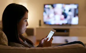📺 We Now Watch TV While Not Watching TV (Apparently That’s Normal)