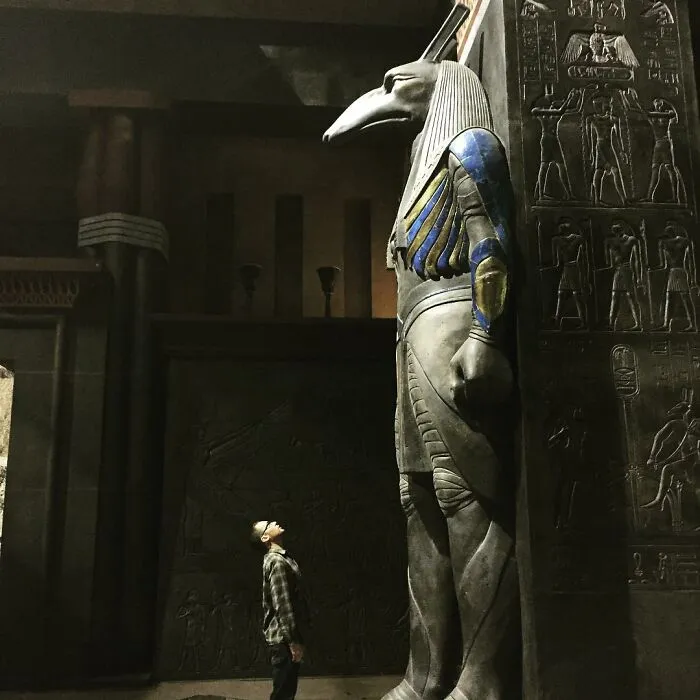 A Large Anubis Statue On Display