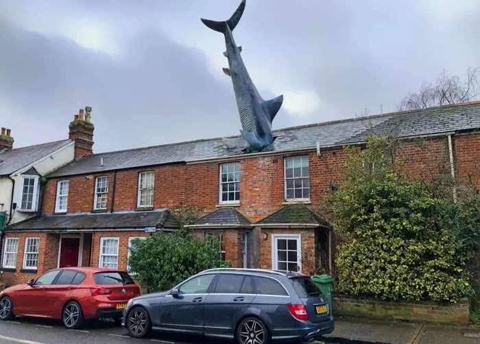 United Kingdom. This Is A Private House That Has A Shark In The Roof