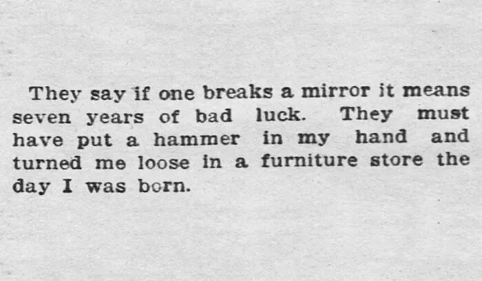 Vintage newspaper clipping showing a humorous take on bad luck and breaking mirrors from the old days.