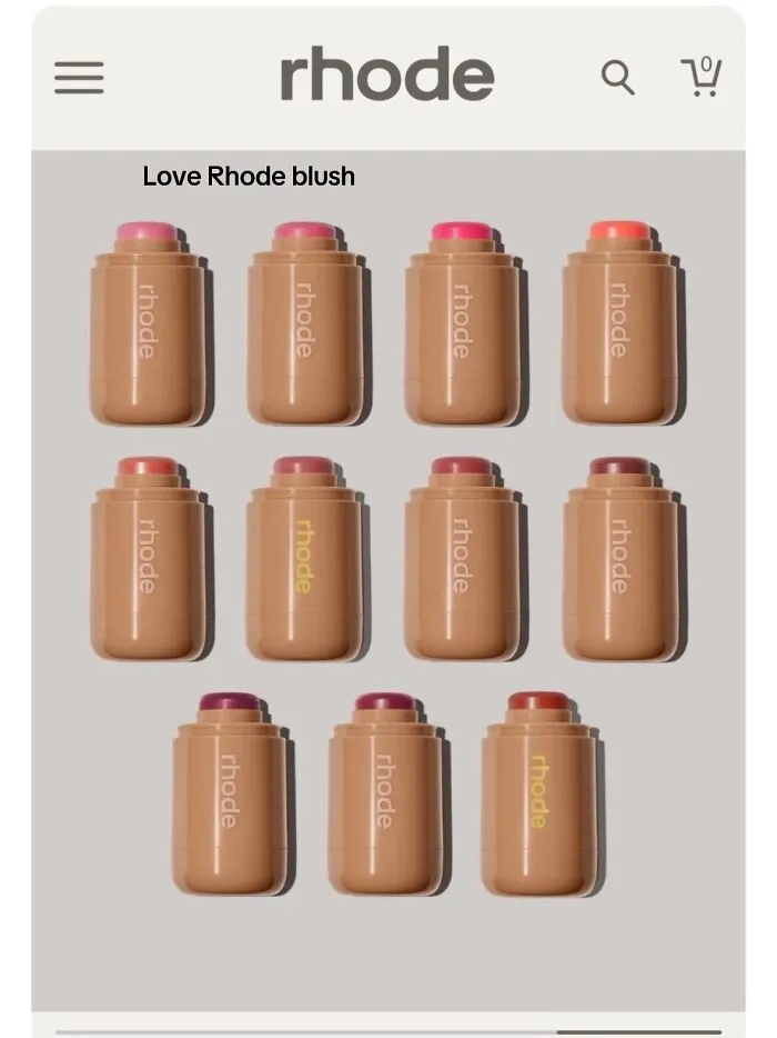 Multiple shades of Rhode blush sticks arranged in a grid on a light background showcasing popular Christmas gift ideas.