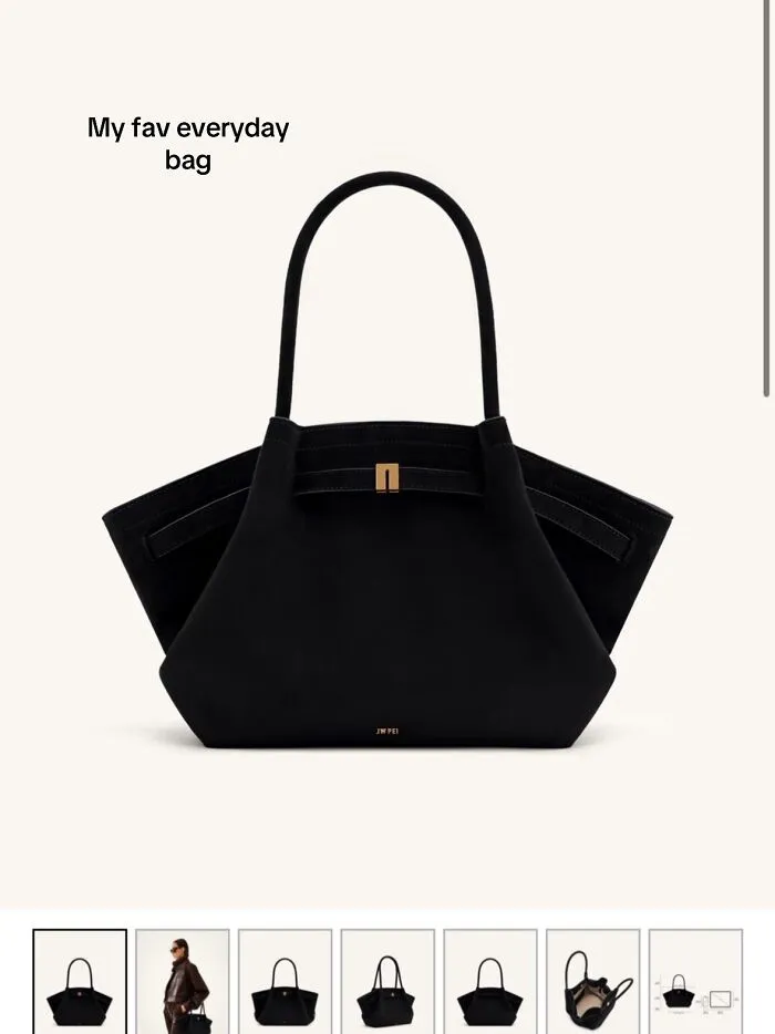 Black everyday bag with gold clasp, featured as a highly recommended Christmas gift and prized possession.
