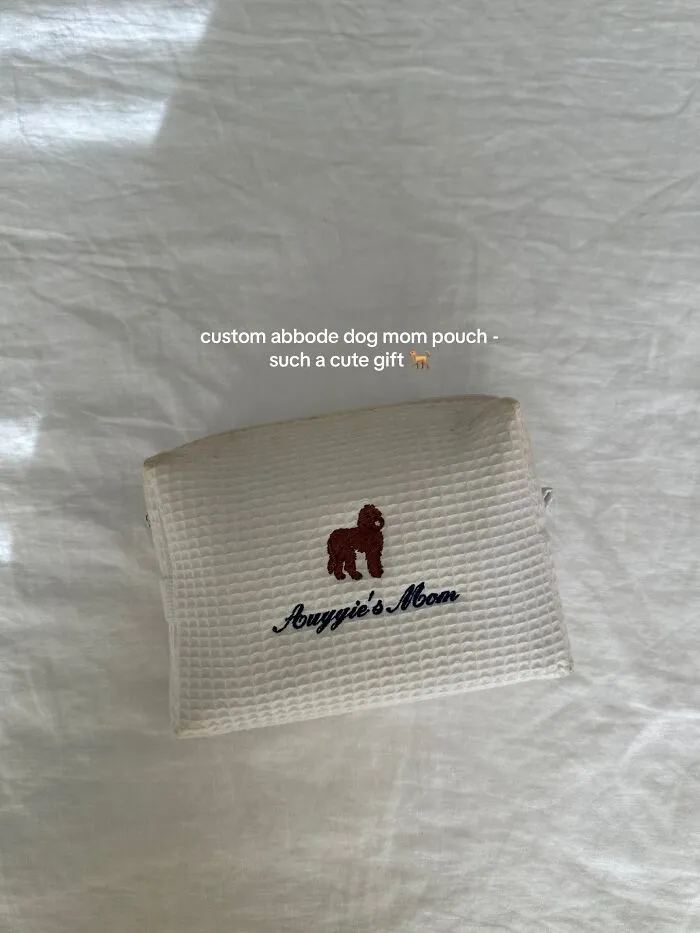 Custom dog mom pouch embroidered with a dog design, a highly recommended Christmas gift for pet lovers.