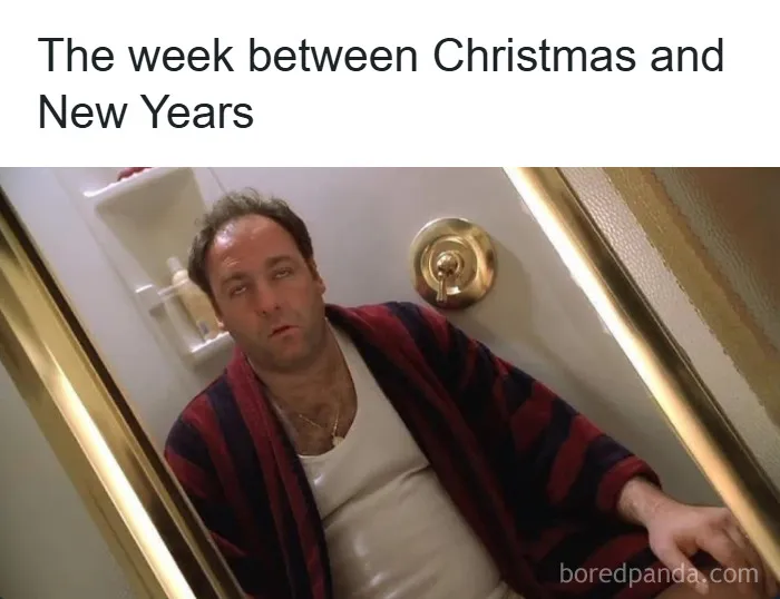 Man in bathrobe looking tired and unhinged inside a shower, capturing funny unhinged memes vibe by grapejuiceboys.
