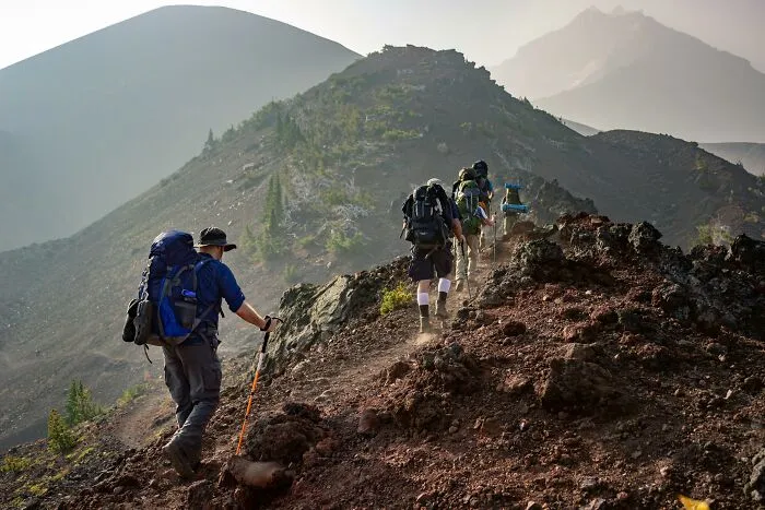 You’re hiking with a group and someone slips off a cliff edge. You can save them, but doing so may drag you down too.