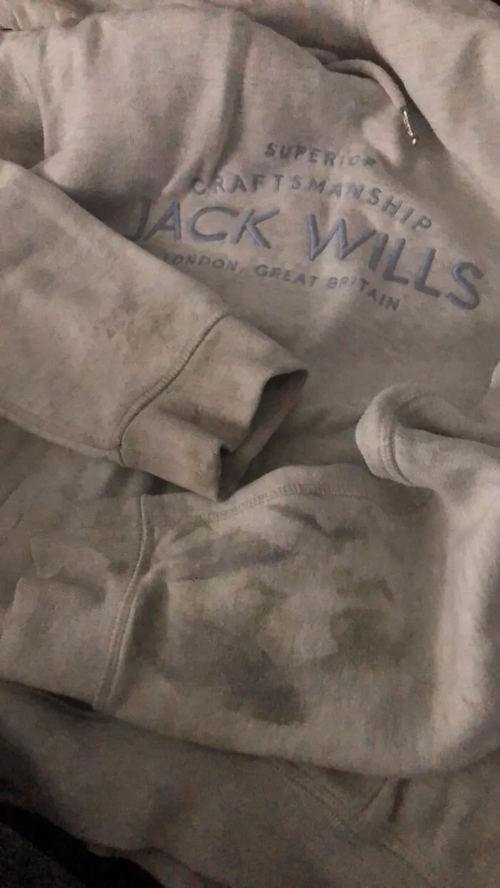Faded Jack Wills sweatshirt with visible stains and wear featured in unhinged Vinted posts causing double take.