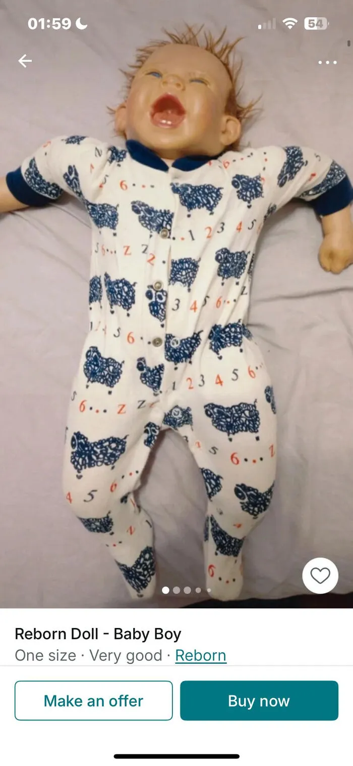 Unhinged Vinted post showing a reborn baby boy doll in sheep-patterned pajamas with a wide open mouth expression.