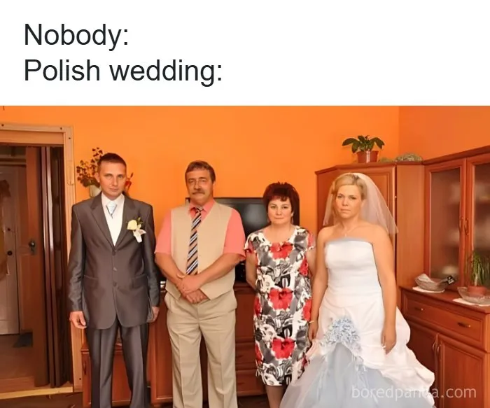 Polish wedding family photo with bride, groom, and relatives in an orange room, capturing Eastern Europe humor and culture.