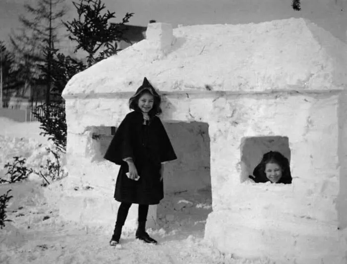 2 Girls Smile From Their Fantastic Snow Fort, Circa 1910
