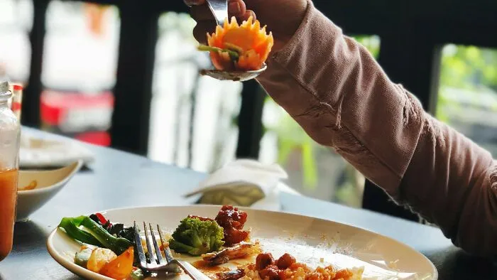 My wife is not a big eater, but she prefers a wide variety of foods whenever we go out. This ends up being costly and inefficient, because she will order a few dishes and sides, only to have a few bites of each. I started being upset about the checks and having to finish her leftovers, most of which I don’t even enjoy, to justify the price. The next time we went out, I told her to order off the kids’ menu. She thought I was joking, but when I asked the waiter for a kids’ menu, she got upset with me and said that I was insulting and belittling her.