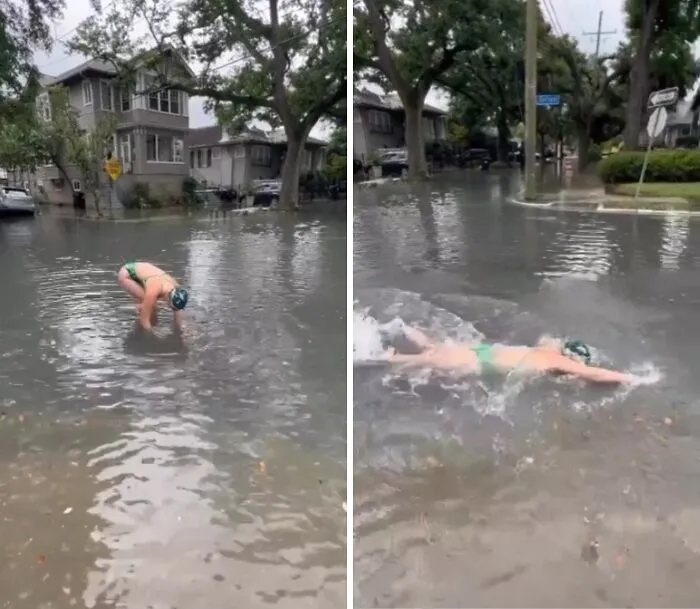 Person wearing swimwear diving and swimming in flooded street water during a heavy urban flood, showcasing weird street discovery.