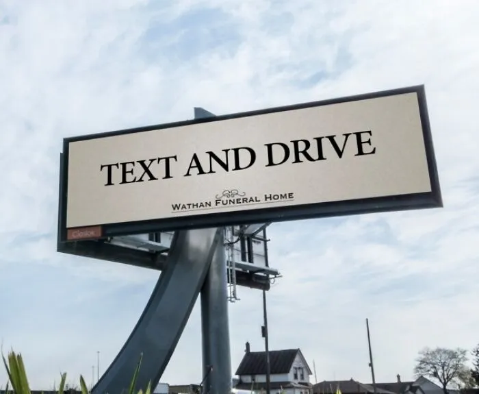 "Text & Drive" Wathan Funeral Home Billboard