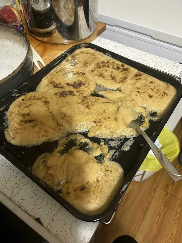 Melted and misshapen dessert on a baking tray, showing a clear case of people ruining dessert unexpectedly.