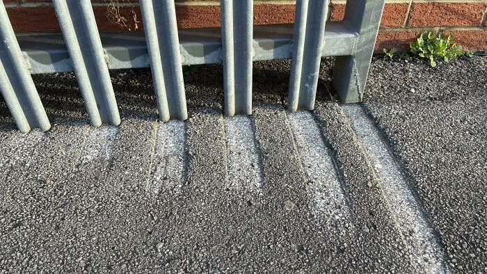 Gate Etching Perfect Lines In The Concrete