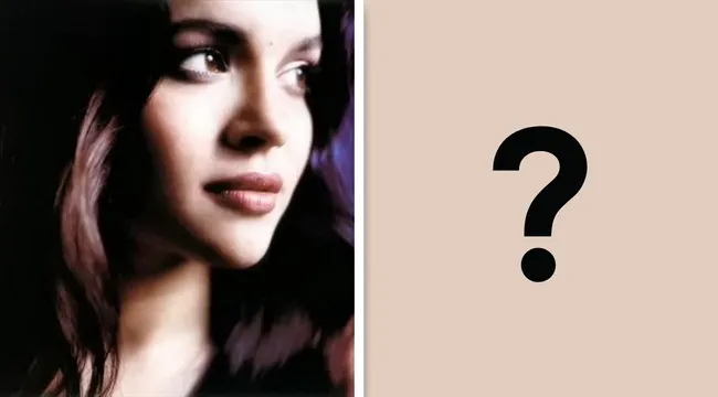 Close-up of a woman's face on an album cover, part of a challenge to guess the 2002 album from its cover.