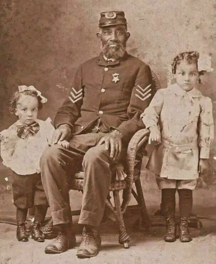 A Civil War Veteran With His Grandchildren