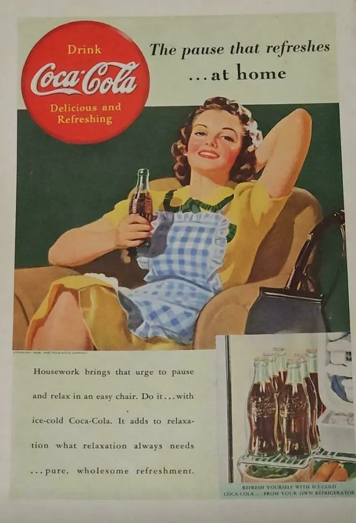 Vintage women’s ad showing a woman relaxing at home with a Coca-Cola promoting vintage women’s ads and societal roles.
