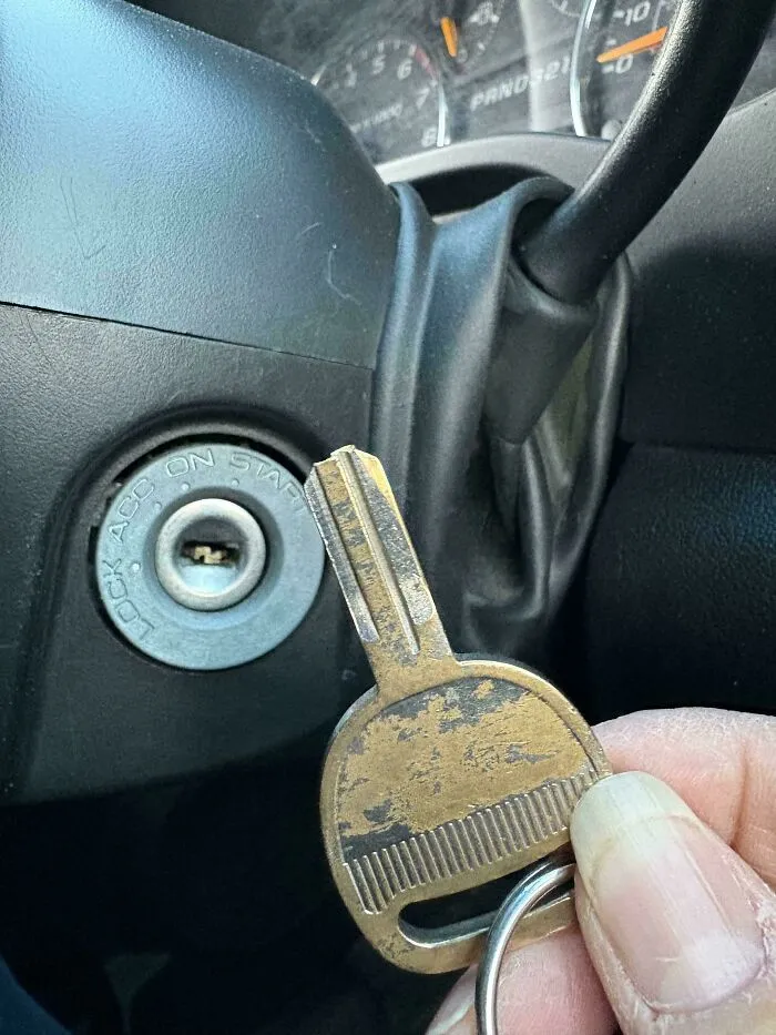 Worn-out key unable to start the car, illustrating unfortunate events that make your day feel better.