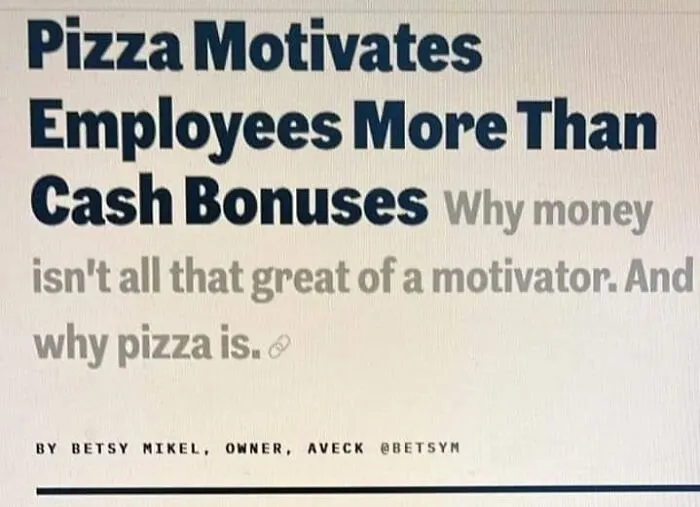 Text image showing a motivational statement that pizza motivates employees more than cash bonuses in a dystopia context.