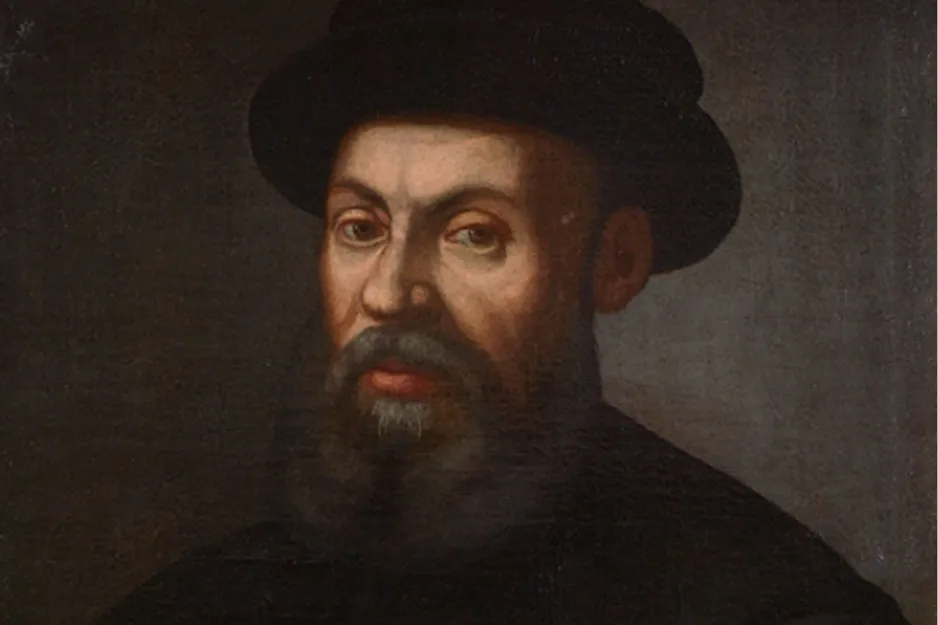 Portrait of European explorer Ferdinand Magellan wearing a dark hat and cloak, known for discovering a key ocean passage.