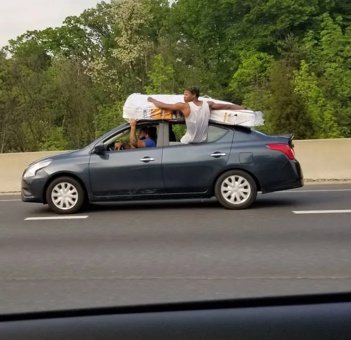 Since The Theme Seems To Be Mattresses On Cars, Here's One I Caught A Little While Ago. We Were Going 65+ MPH On 695