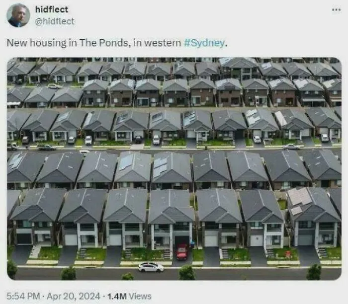Aerial view of densely packed new housing in western Sydney, illustrating modern urban hell and the price of city life.