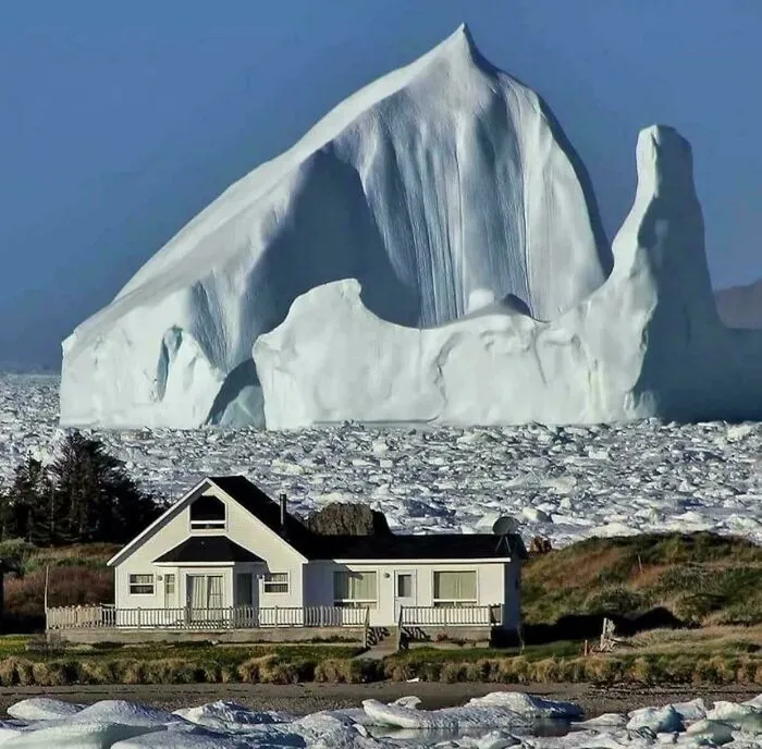 150 Ft Iceberg Floating By A Small Town In Newfoundland, Canada. Give Me The Heebie
