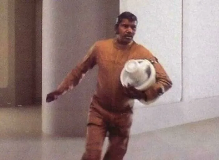 In The Empire Strikes Back (1980) When Lando Orders The Emergency Evacuation Of Cloud City, This Guy Grabs The Ice Cream Maker As He Flees Because He Has His Priorities Straight