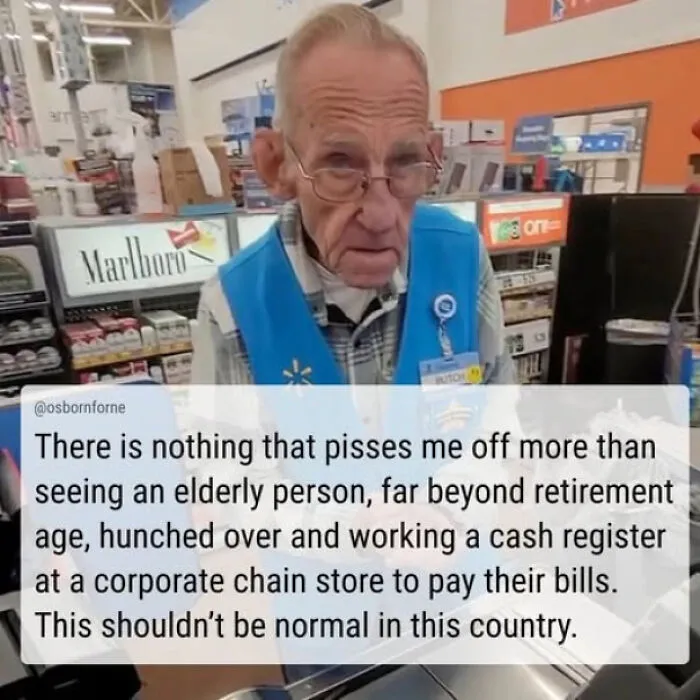 Elderly Walmart employee working a cash register, highlighting social issues in the world we're living in.