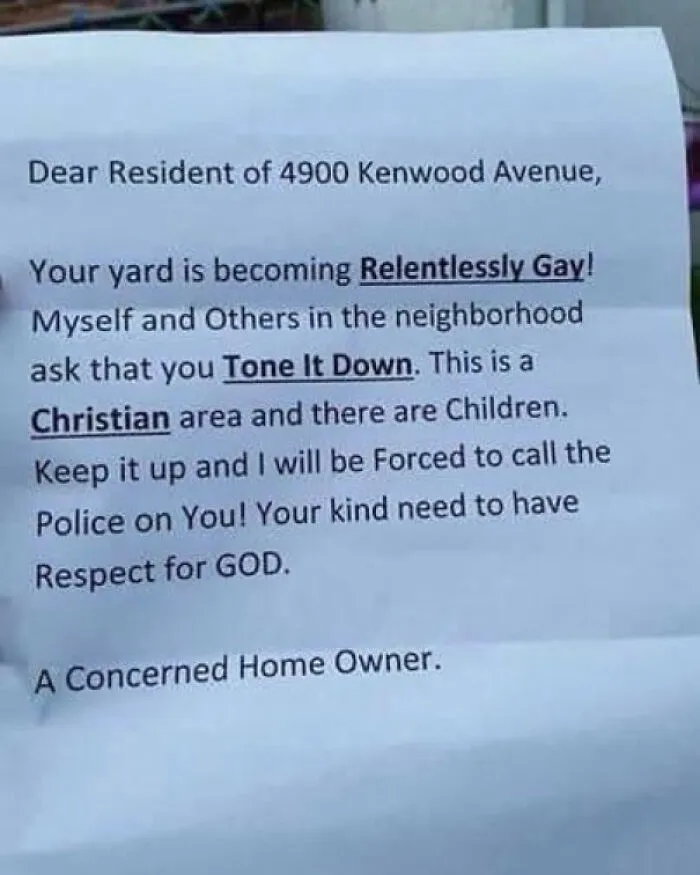 Note with a confrontational tone about a yard becoming relentlessly gay, calling out the world we're living in.