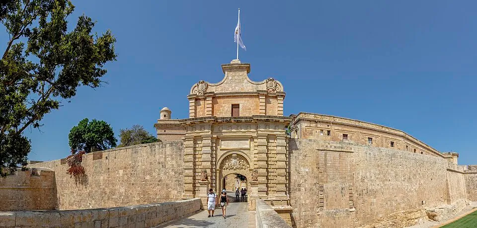 Historic stone fortress entrance under clear sky, part of the Guess 25 Countries From A Single Picture country challenge.
