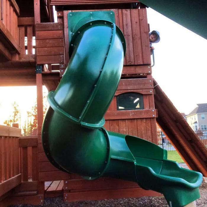 Someone Didn't Read The Slide's Instructions. It Drops The Kid On His Head