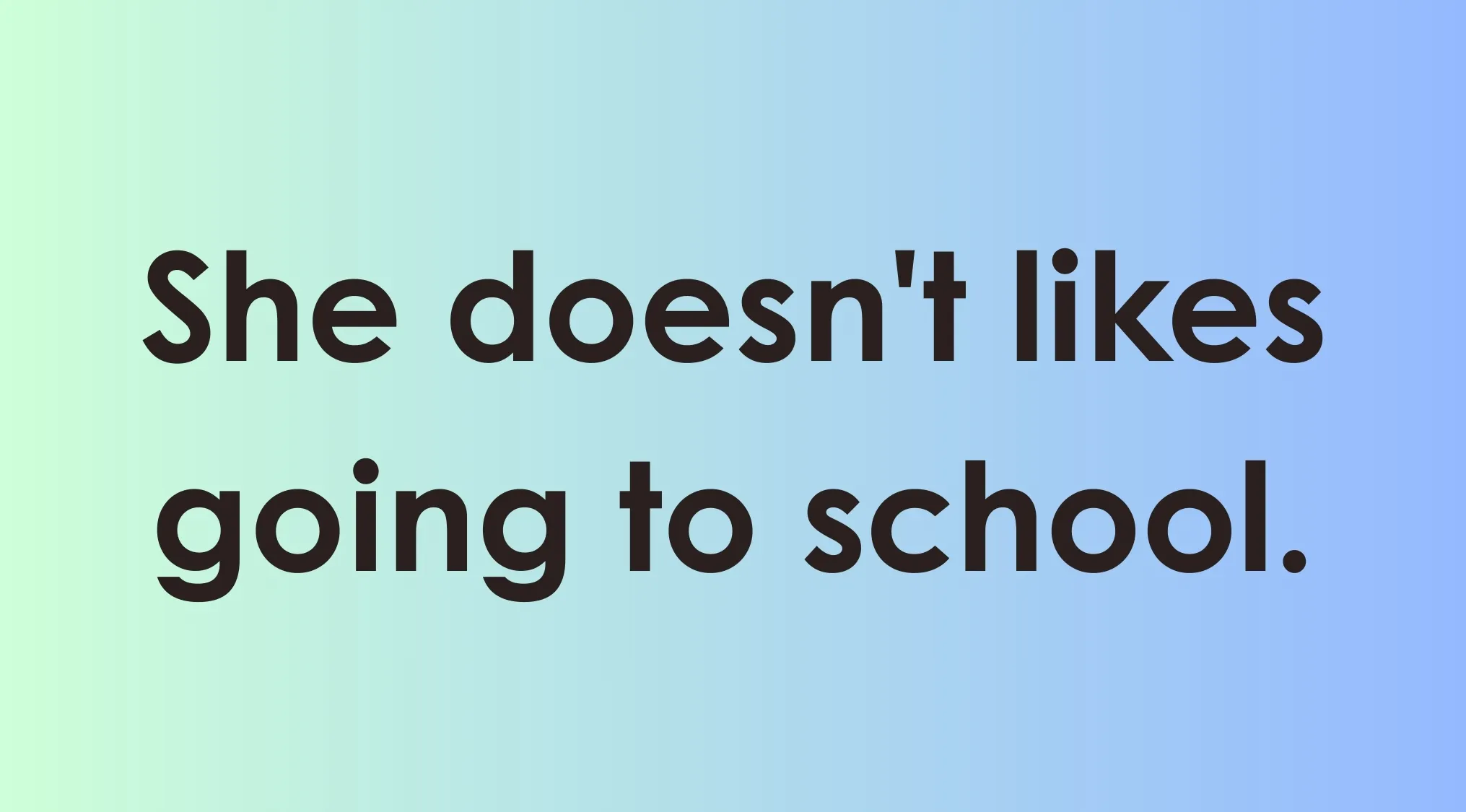 Corrected sentence She doesn't like going to school shown on gradient background for language learning.