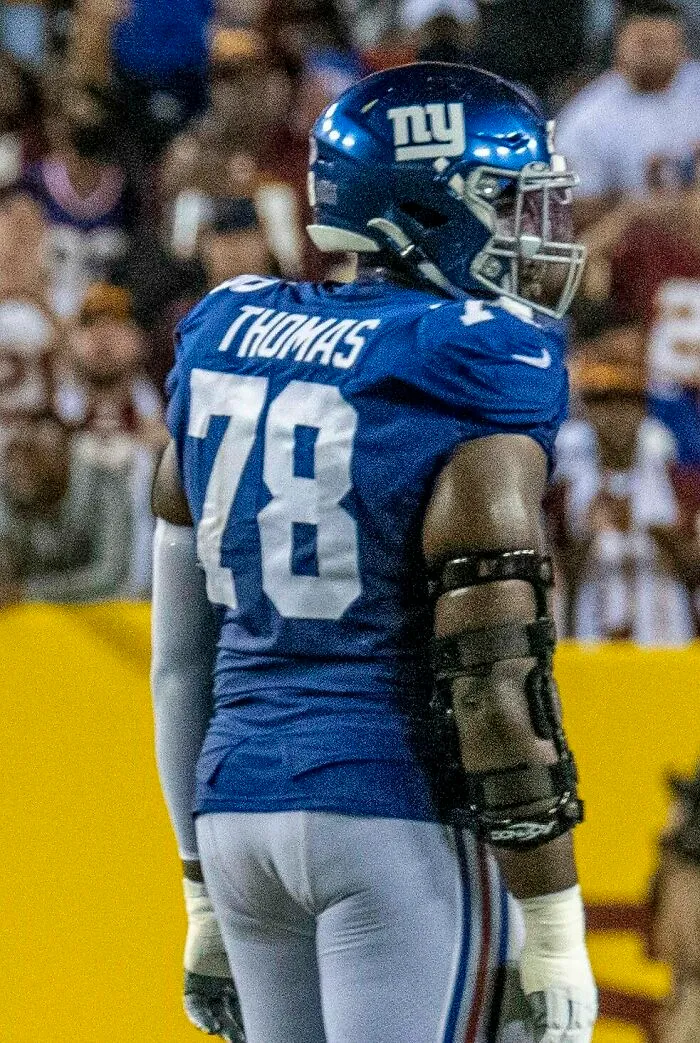 Football Player Andrew Thomas, 27
