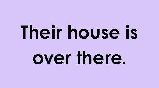 Text on a purple background highlighting the sentence containing a homophone pair: Their house is over there.