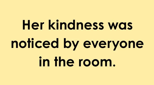 Sentence illustrating suffix usage in UK school grammar test with the word kindness highlighted on a yellow background.