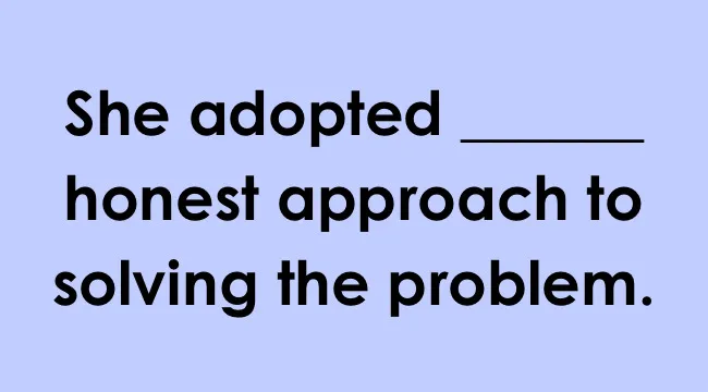 UK school grammar test question showing sentence with blank for choosing the correct article in a grammar exercise.