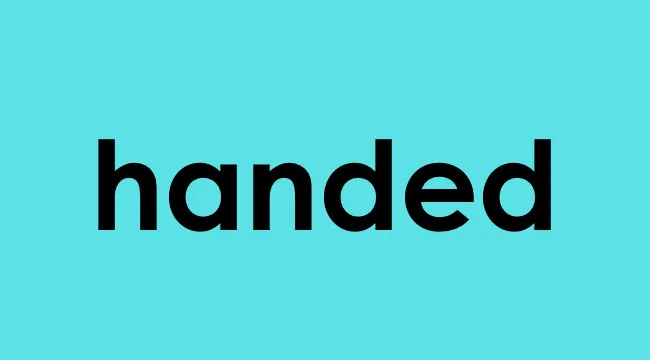 The word handed displayed in bold black text on a light blue background, highlighting a determiner example.