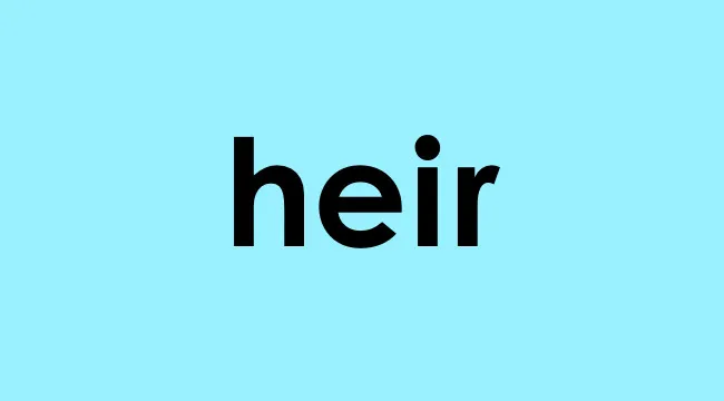 The word heir displayed in bold black text on a light blue background for homophone choice.