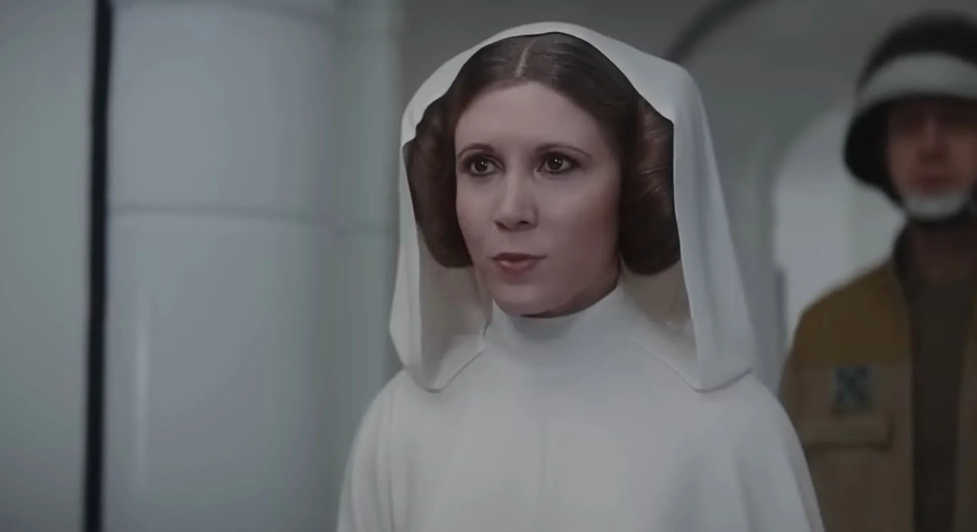 Princess Leia in her iconic white outfit and hairstyle, a key supporting character related to Luke Skywalker.