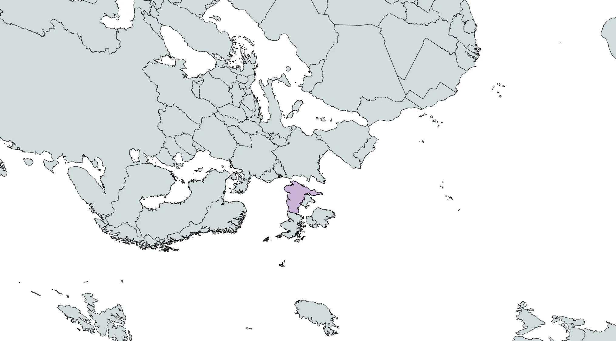 Rotated world map with a country highlighted in purple for a geography challenge to guess the country location.