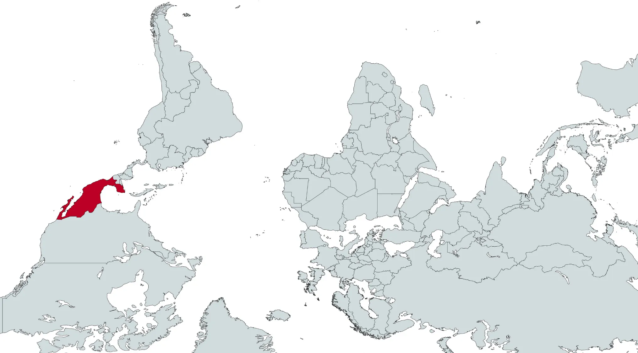 Rotated world map with one country highlighted in red for geography challenge to identify the country from its mirrored map.