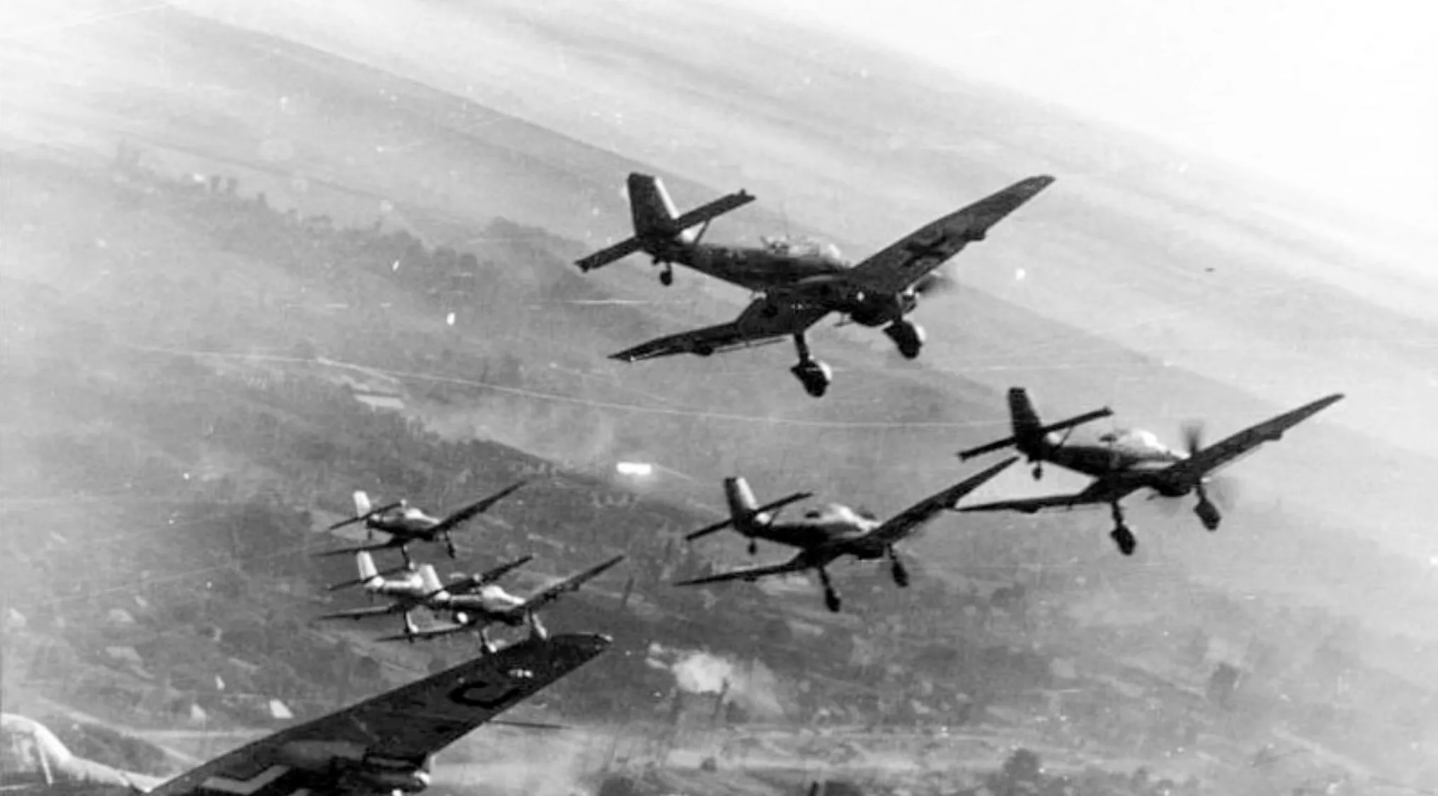 WWII aircraft flying in formation representing NATO, Morse code, and Greek alphabet combo quiz concept.