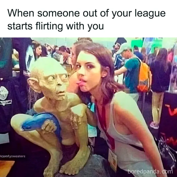 Woman making a funny face next to a Gollum statue, capturing a moment from funny memes for low energy moments.