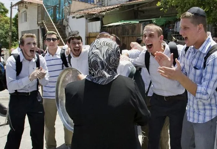 Group of young men reacting emotionally to a woman holding a metal tray in an outdoor setting, internet photo illusion.