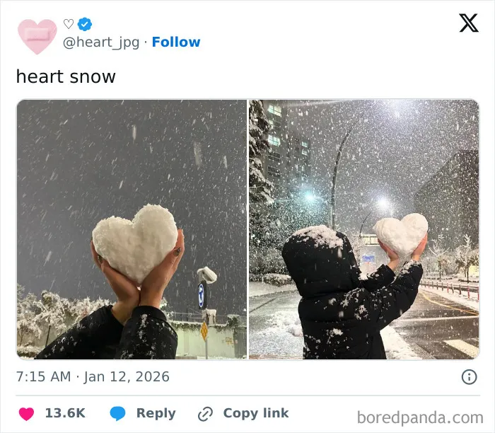 Hands holding a heart-shaped snowball during heavy snowfall at night, capturing cozy winter moments outdoors.