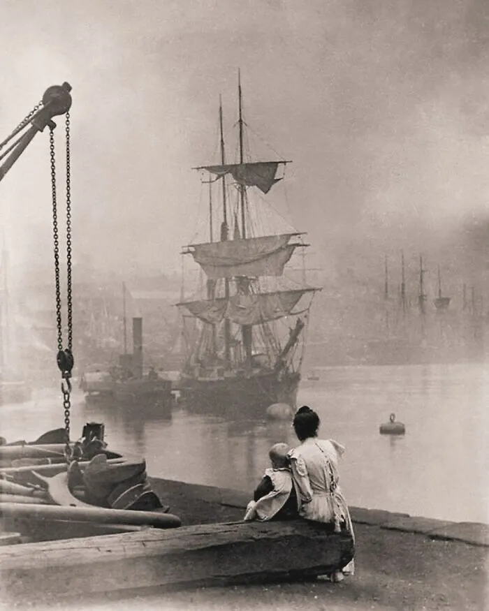 A Mother And Daughter Watch A Tall Ship Navigate The Thames In London, 1880