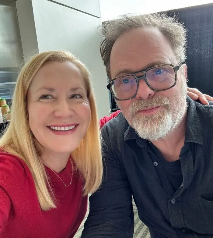 Cast members from the TV series The Office smiling together in a casual indoor setting for a meme-inspired photo.