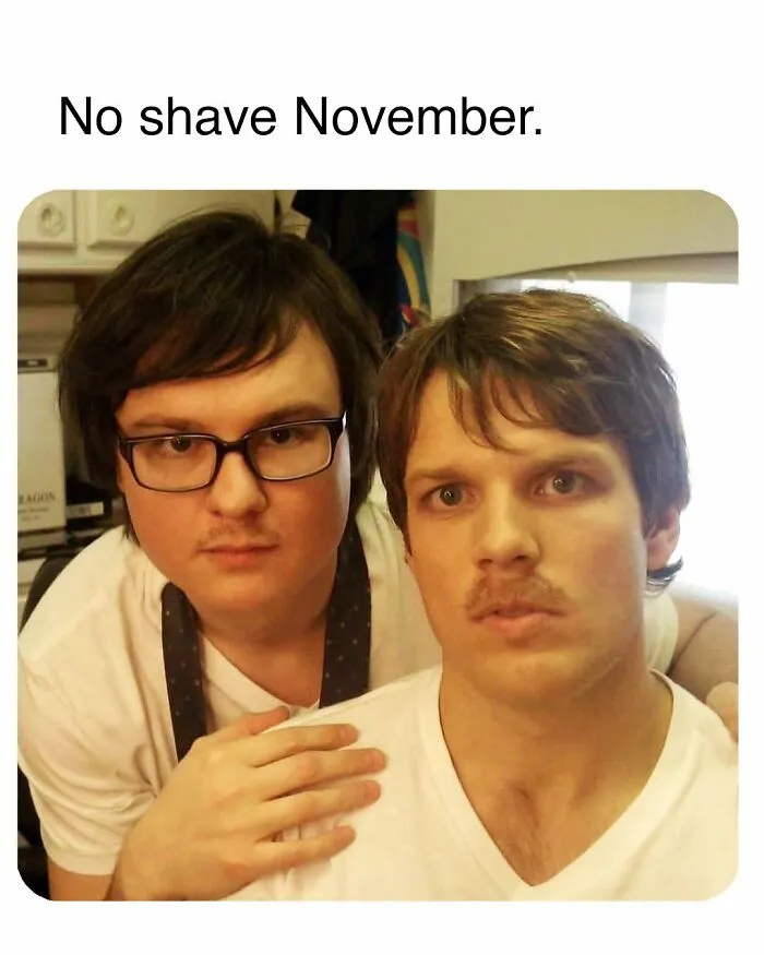 Two men with early facial hair posing indoors, a humorous meme related to people cracking up at memes inspired by The Office.